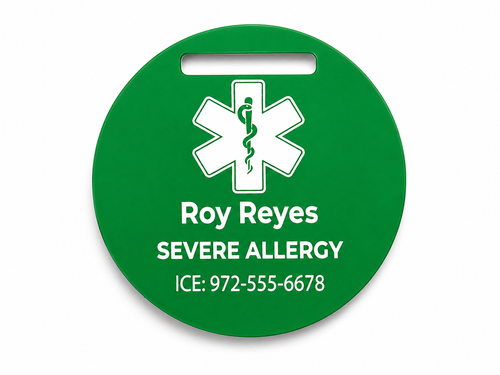 Green medical alert tag with a star of life symbol and personalized text on a white background