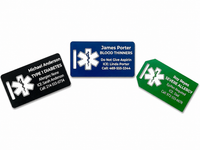 Three medical alert tags in black, blue, and green on a white background