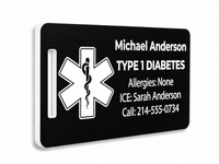 Black medical ID tag with white text and symbol on a white background
