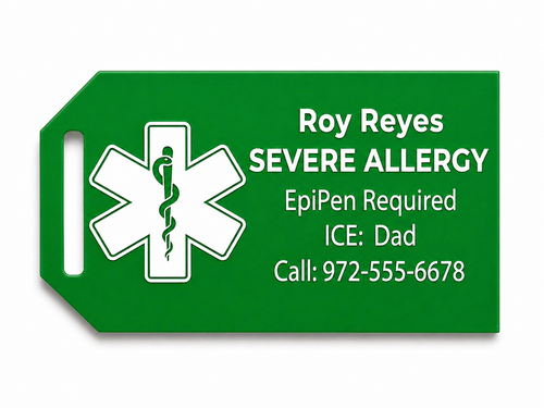 Green medical alert tag with emergency contact information on a white background