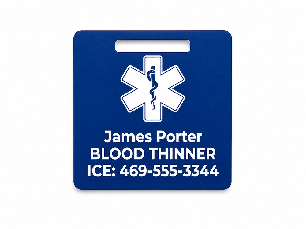 Blue medical alert tag with a star of life symbol and personalized text on a white background