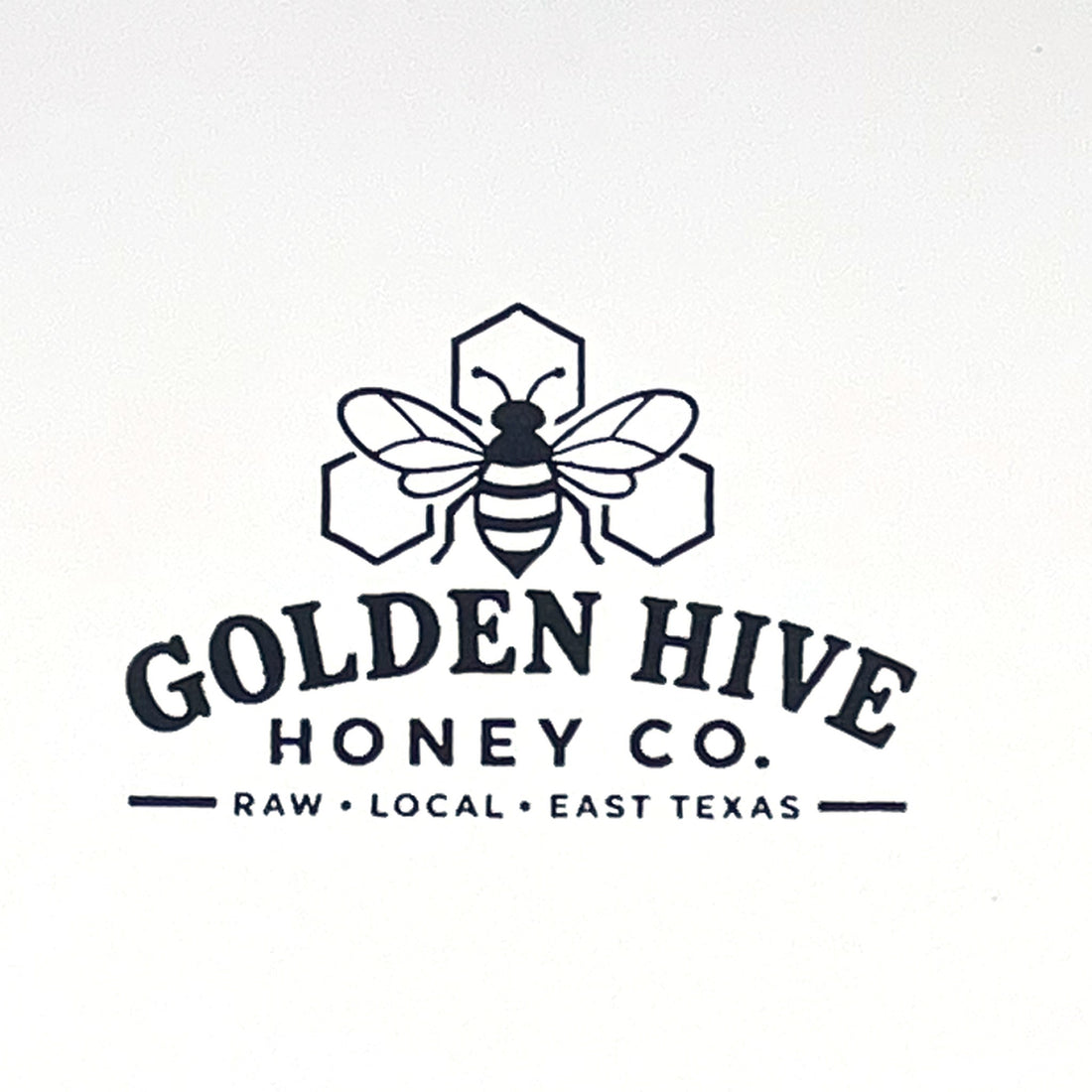 Close-up of a crisp custom logo stamp impression on white paper