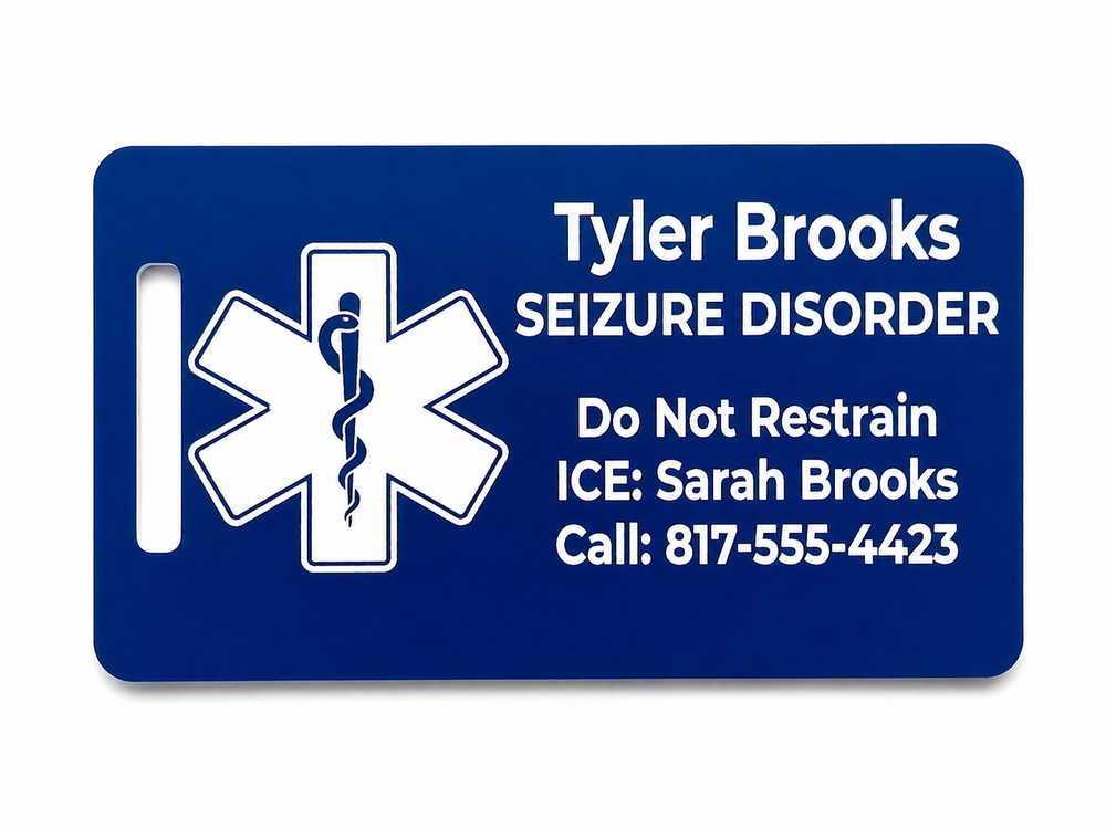 Blue medical alert tag with star of life symbol and personalized text on a white background