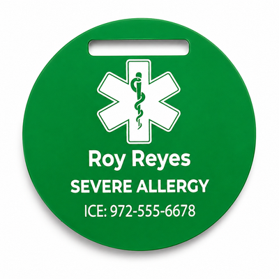 Green medical alert tag with a star of life symbol and personalized text on a white background