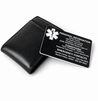 Black leather wallet with an emergency contact card featuring an asterisk symbol on a white background
